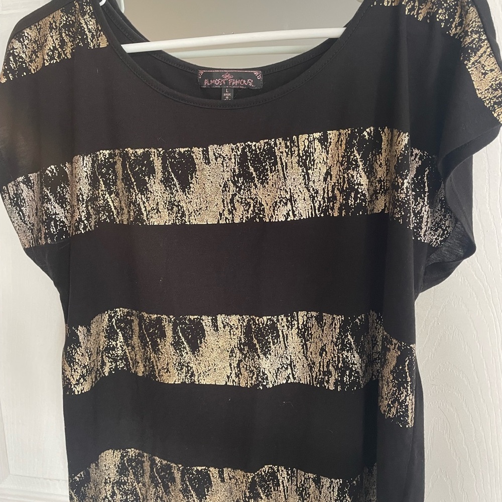 Black and gold woman’s shirt